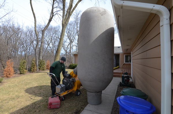 vacuuming out the air ducts of a Hartford, WI home